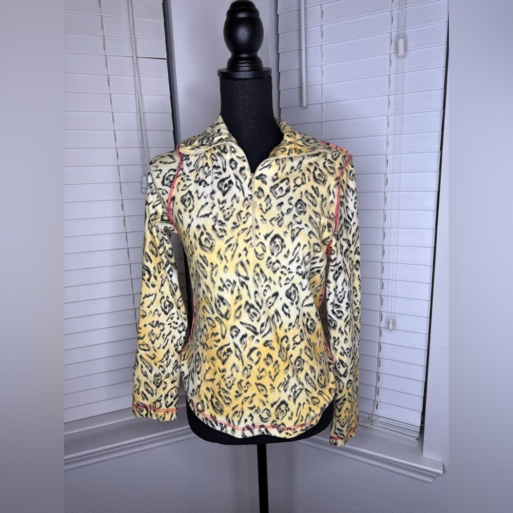 Chic Animal Print Blouse with Red Trim